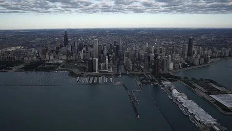 Chicago Circa-2015, high altitude wide aerial view flying over Lake Michigan Stock Footage 98380978