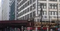 Chicago City with El Train Passing on Elevated Tracks Urban Transportation Day 4k or 4k+ Resolution