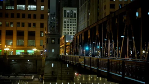 Chicago city at night . Elevated transportation bridge across the river in Stock-Footage 310636233