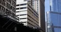 Chicago City Skyline Office Buildings and Metro Train Passing on Elevated Tracks 4k or 4k+ Resolution