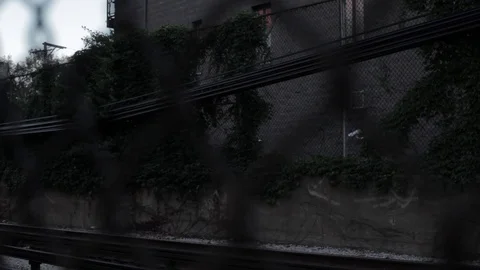 Chicago CTA Subway Rolls By Through Fence 3 Stock Footage 79019957