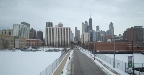 Chicago dolly moving tracking shot winter snow Stock Footage