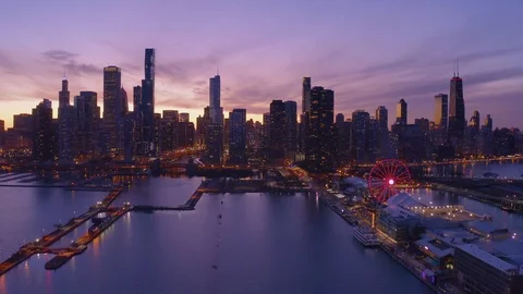 Chicago downtown buildings skyline aerial drone flying navy pier evening Stock Footage