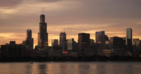 Chicago downtown buildings skyline evening sunset Lake Michigan Stock Footage