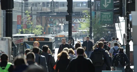 Chicago downtown commuter crowd of people walking street traffic train Stock Footage