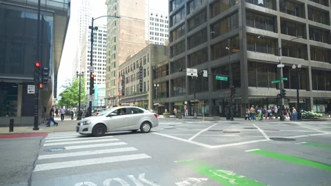 Chicago Downtown Intersection With Traffic And Pedestrians Video stock 336011268