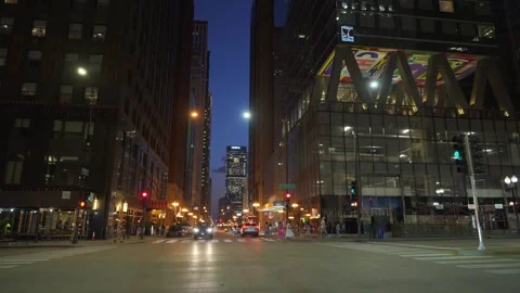 Chicago Downtown Intersection With Traffic And City Lights At Night Video stock 336277384
