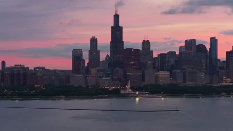 Chicago downtown skyline with Sears Tower during crimson sunset over Lake Michig Stock Footage 337895897