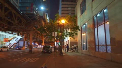 Chicago Downtown Street With Elevated Train Tracks And Traffic At Night Stock Footage 336280819
