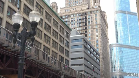 Chicago Elevated Train Crossing Above Street With Buildings Stock Footage 336263742
