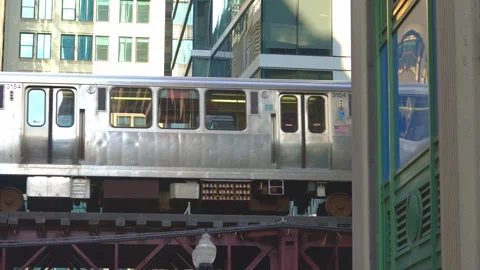Chicago Elevated Train Passing Between Modern Buildings Stock Footage 336262682