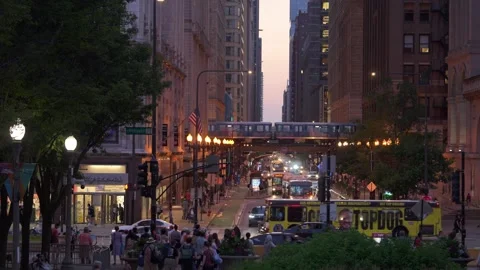Chicago Elevated Train Passing Through Downtown Street At Dusk Stock Footage 336275468