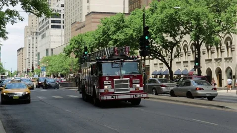 Chicago Fire Department engine driving in the city Stock Footage 82547993