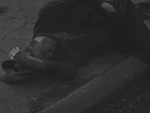 Chicago, IL - 1930s: Man lying on ground Stock Footage 231828345