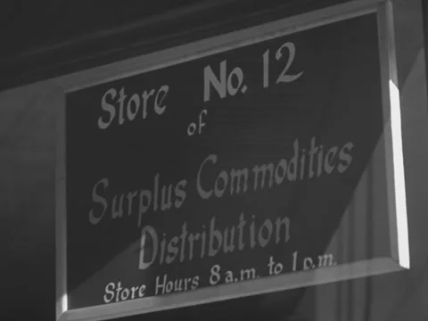 Chicago, IL - 1930s: People in commodities distribution line Video stock 231826560