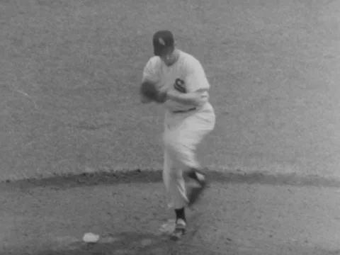 Chicago, IL - 8/29/57: Enos Slaughter hits a fly ball off Dick Donovan Stock Footage 233120240