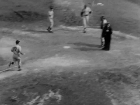 Chicago, IL - 8/29/57: Enos Slaughter comes in to score on home run Video stock 233120253
