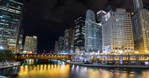 Chicago, IL, USA - Chicago River with skyscrapers at night - Timelapse zoom out Stock Footage 75288881