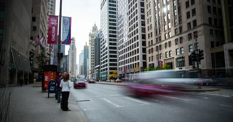 Chicago, IL, USA - traffic at Michigan Avenue with bus stop - Timelapse Stock Footage