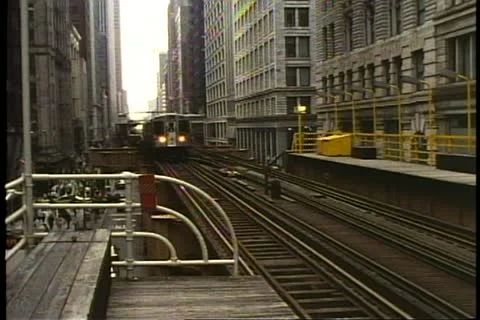 CHICAGO, ILLINOIS, 1994, Elevated train approaches, public transit, the L 動画素材 10916377