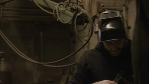 Chicago Interior Young Man Fixing Welder Stock Footage 89997575