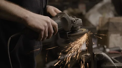 Chicago Interior Young Man Grinding Sparks MCU Stock Footage 89997144