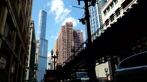 The Chicago Loop Train Passing By With Trump Tower In The Back Stock Footage 134347308