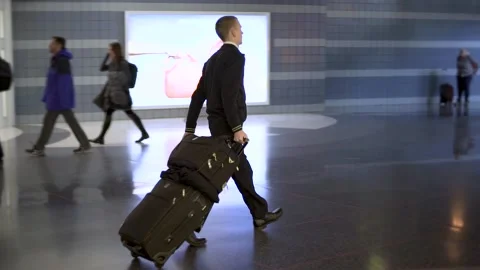 Chicago O'Hare Airport Flight Attendant Briskly Walks in Airport Stock Footage