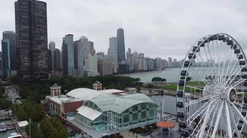 CHICAGO-PUSH PAST FERRIS WHEEL TO JOHN HANCOCK Stock Footage 247456707