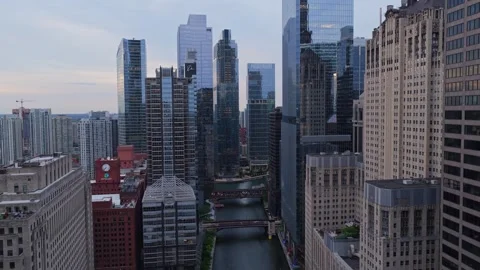 Chicago River between skyscrapers in the Loop area of downtown Chicago, urban ca Stock Footage 337313599