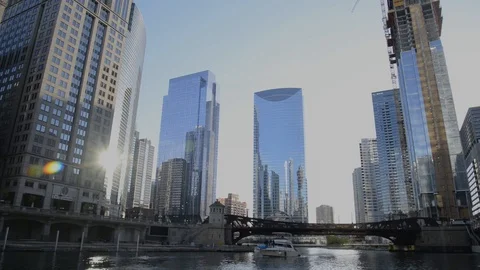 Chicago River Passing Boat with post modern glass architecture in background Stock Footage 116451364