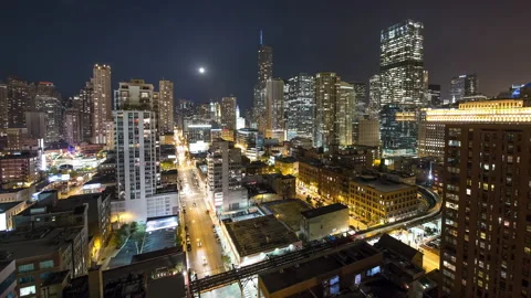 Chicago - Rooftop View at Night with Skyline and Trains - 4K Timelapse Stock-Footage 220816248
