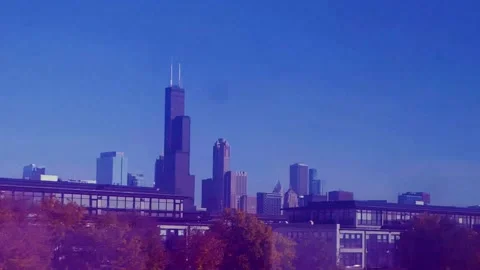 The Chicago skyline comes into view as one of Metra's trains heads into downtown 動画素材 221201340