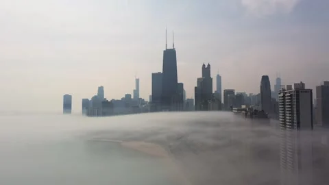 Chicago Skyline Emerging From Dense Morning Fog Stock Footage 342813819