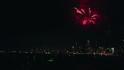 Chicago Skyline Fireworks Exploding Above Midnight City Lights Stock Footage 319997428