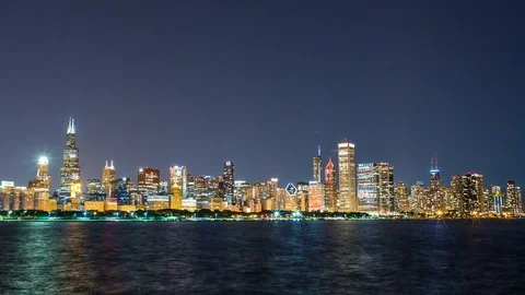 Chicago Skyline at night time lapse with Lake Michigan 4K 1080P Stock Footage 77574333
