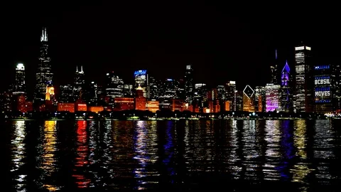 Chicago Skyline Reflected on the Lake at Night Panoramic Stock Footage