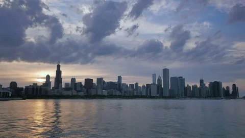 Chicago Skyline Reflected on the Lake at Sunset Stock Footage 80540103