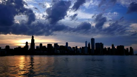 Chicago Skyline Reflected on the Lake at Sunset Stock Footage 87095002