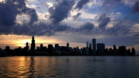 Chicago Skyline Reflected on the Lake at Sunset Stock Footage 87096113