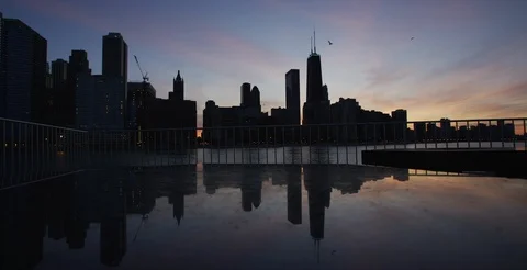 Chicago - Skyline Reflection at Sunset with Birds - 6K Slow Motion Video stock 88607093