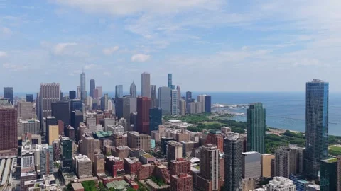 Chicago skyline showing Downtown Loop buildings and Lake Michigan shoreline with Stock Footage 337312408