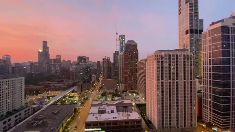 Chicago Skyline Sunset Pan Left North Side Chicago Illinois USA August 21 2023 Stock Footage 331541487