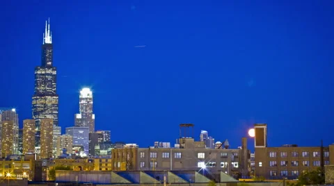 Chicago: Skyline with Willis Tower and Moonrise at Sunset Stock Footage 68928885