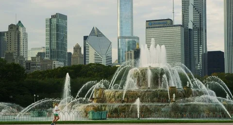 Chicago - Slow Motion Runner Past Buckingham Fountain - 4K Slow Motion Stock Footage 83271799