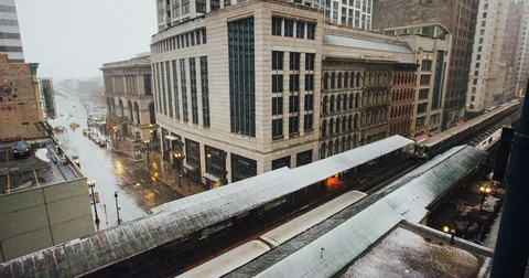Chicago - Snow Falling Looking Over Elevated Train Platform - 4K Slow Motion Stock Footage 83493667