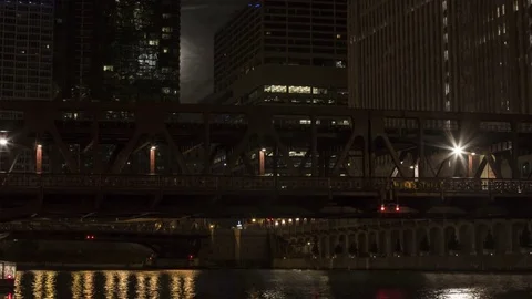 Chicago: Supermoon between Buildings with Trains Stock Footage 72009155