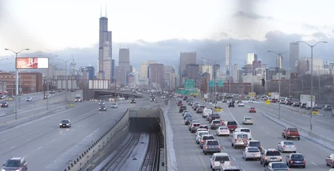 Chicago - Traffic on Expressway as Train Passes During Sunrise - 6K Realtime Stock Footage 112273174