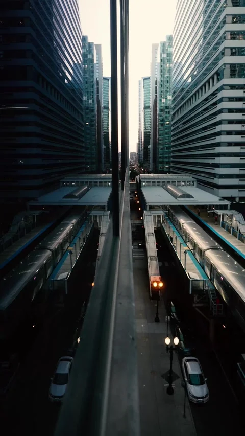 Chicago Train and Glass Reflection Pass-Through Downtown Loop Dusk Stock Footage 331826004