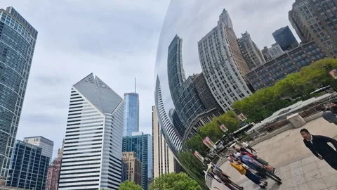 Chicago USA, Cloud Gate aka The Bean Reflections of People and Downtown Towers Stock Footage 325708138